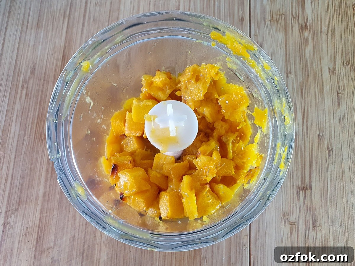 Creamy Mango Ice Cream Recipe: Fresh Mango Frozen Dessert 7 Top down view of mango ready to be blended.
