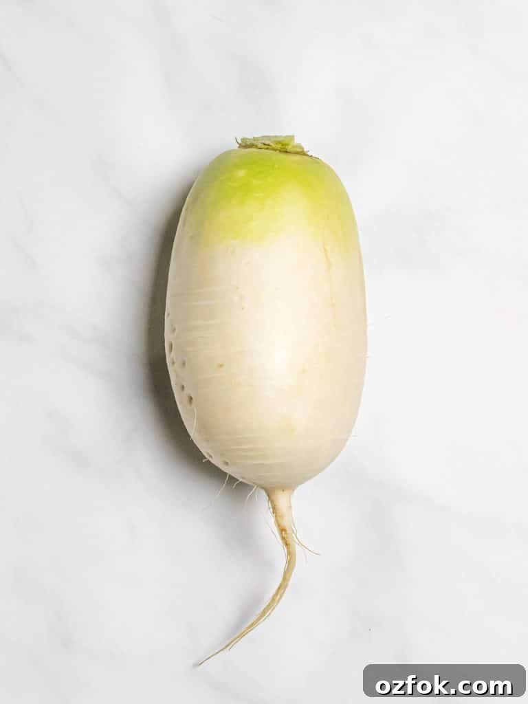 Spicy Korean Radish Salad (Musaengchae) — Authentic Recipe 5 Korean radish on a marble board