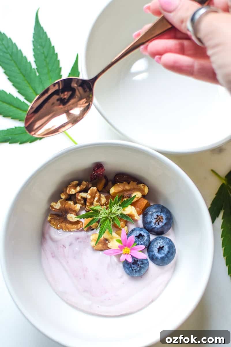 Edibles: Should You Take Them on a Full or Empty Stomach? 6 A picture of a bowl of yogurt with a cannabis leaf.
