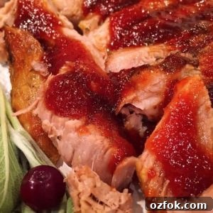 Cranberry-Apricot Glazed Pork Roast: Juicy Holiday Centerpiece 10 Pork Roast sliced with Cranberry Apricot Glaze
