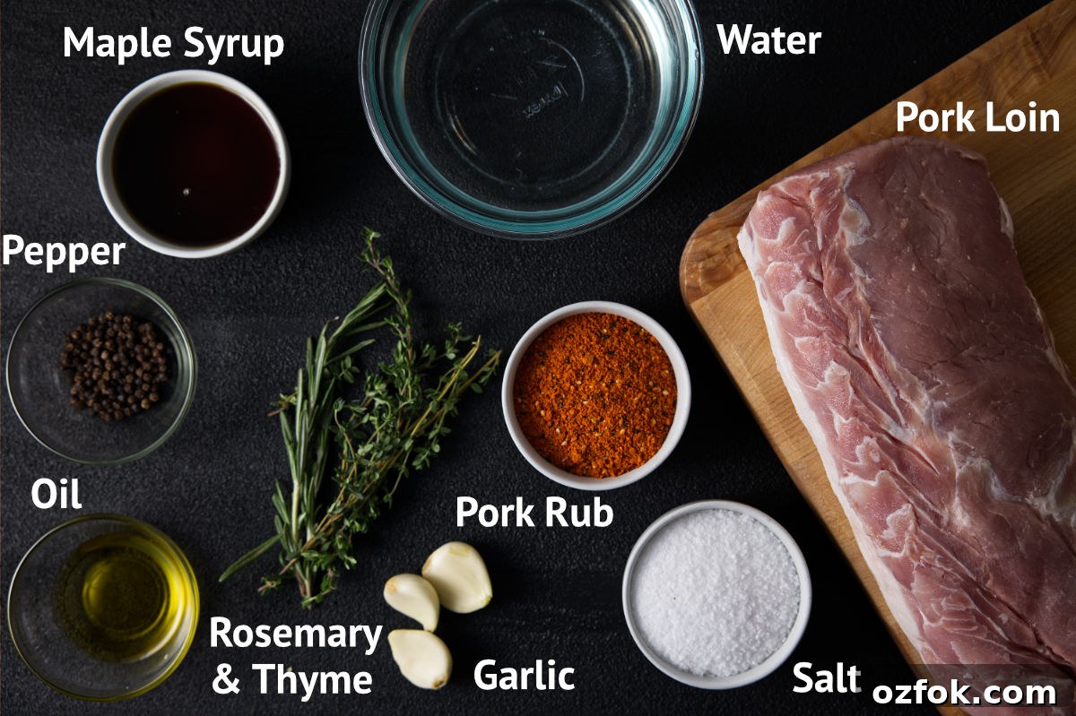 Ingredients for pork loin brine laid out on a charcoal black background.