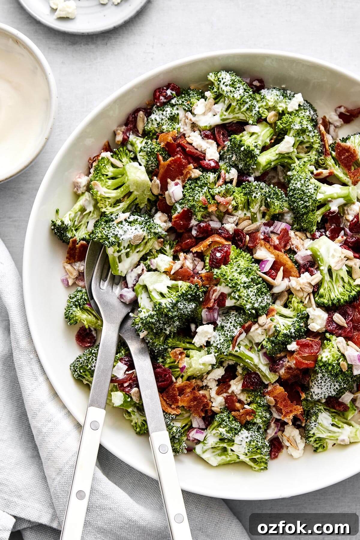 A bowl of broccoli salad for a party side dish.