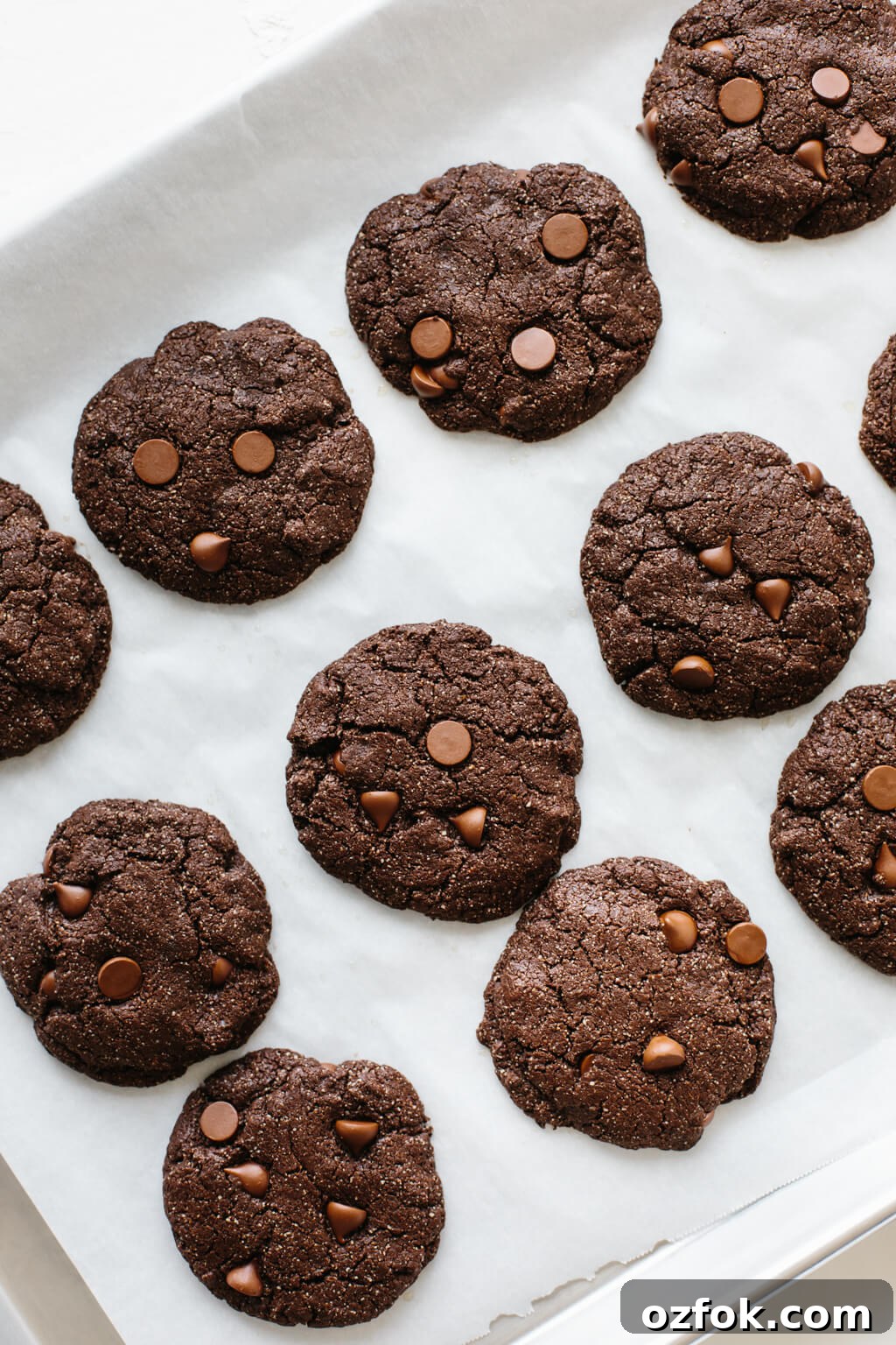 These gluten-free, paleo-friendly mint double chocolate cookies are rich, decadent and highly addictive. They're firm on the outside and lusciously soft on the inside.