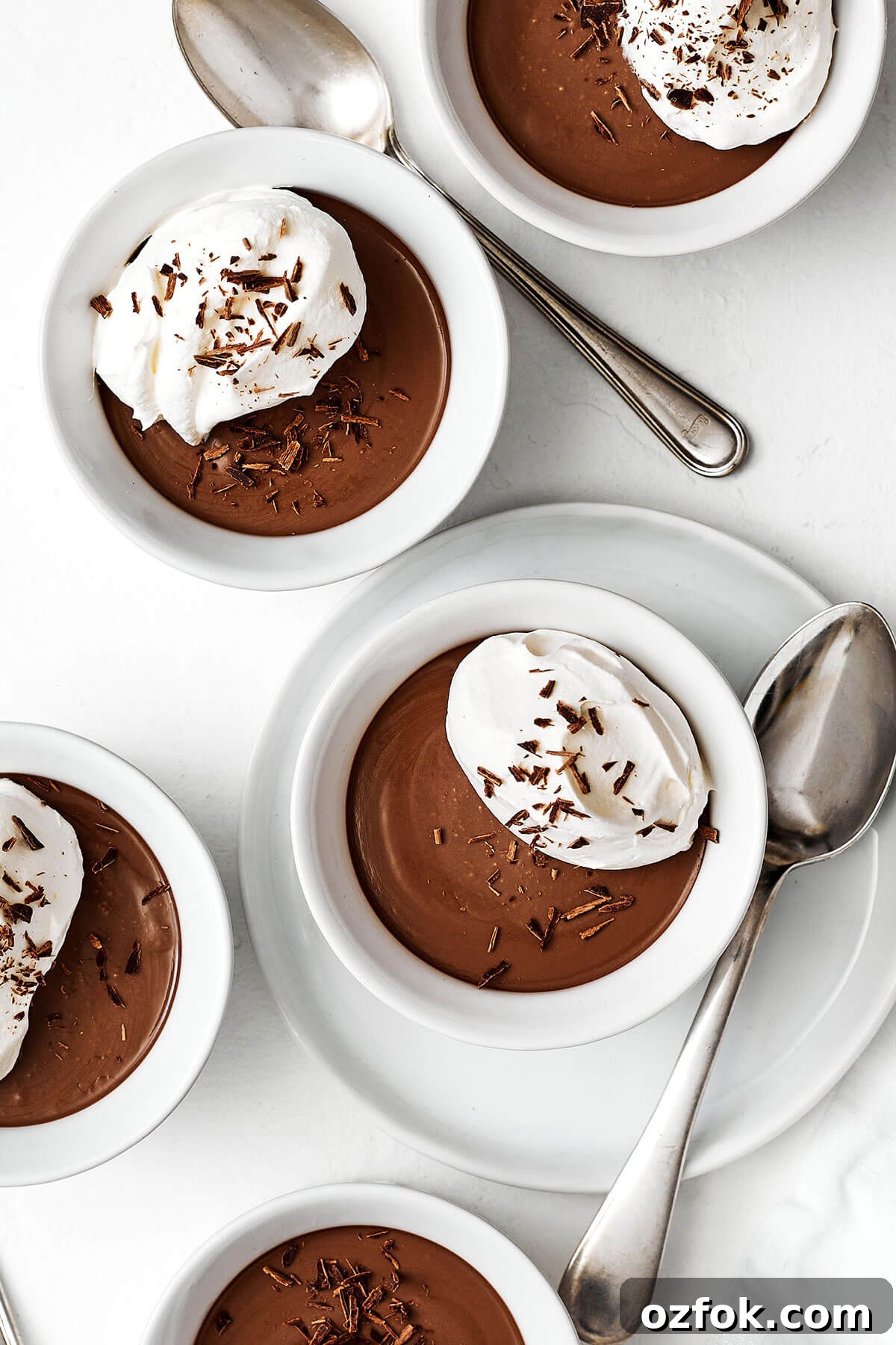 Chocolate pots de creme with spoons