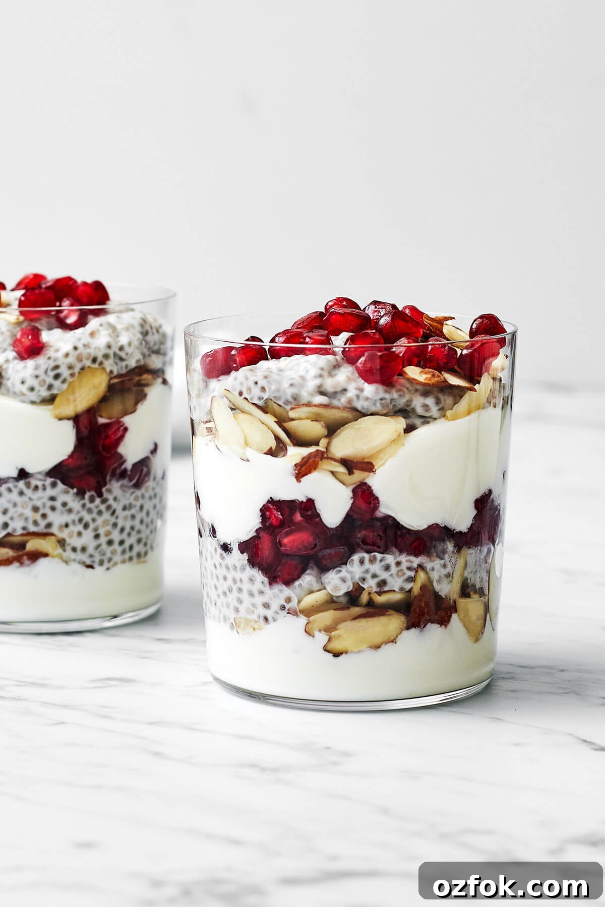 Glass of pomegranate chia pudding parfait