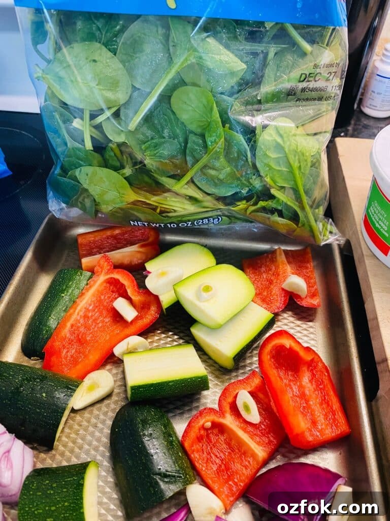 Smoked Veggie Manicotti on the Traeger Grill: Simple Summer Recipe 3 Veggies cut in large chunks on a tray before adding the spinach