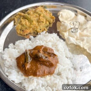Coriander Leaf Kuzhambu (Kothamalli Kuzhambu) Recipe 7 Delicious coriander leaves kuzhambu served with fluffy rice and traditional accompaniments.