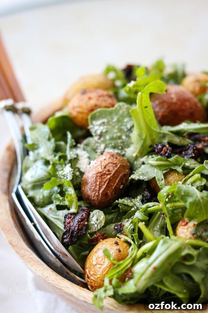 close up of potato and sun dried tomato salad 