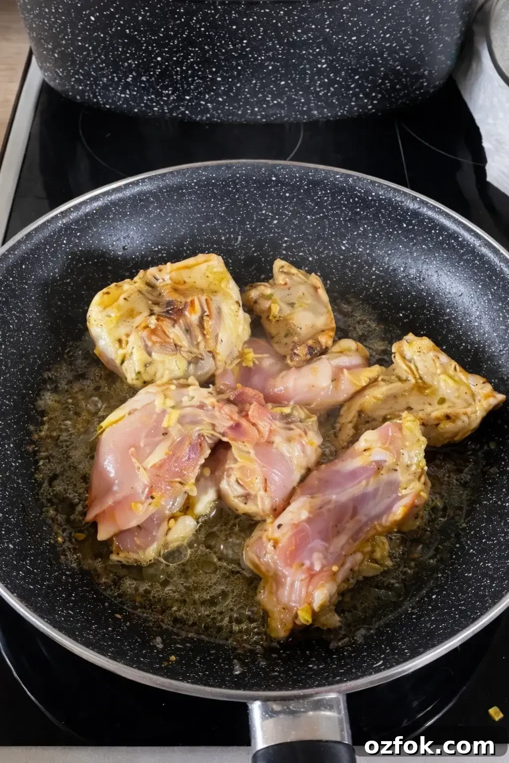 Braised Rabbit in Tangy Mustard Sauce Recipe 3 Browning rabbit pieces