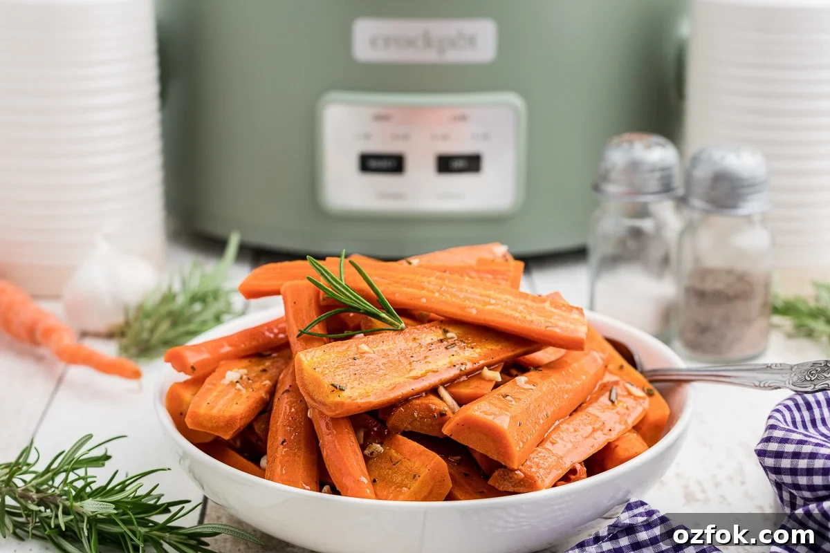 honey garlic carrots in a white bowl.