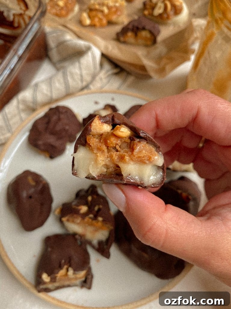 Vegan Gluten-Free Banana Snickers Bites Recipe 2 banana snickers bites on a plate with caramel and chocolate in the background