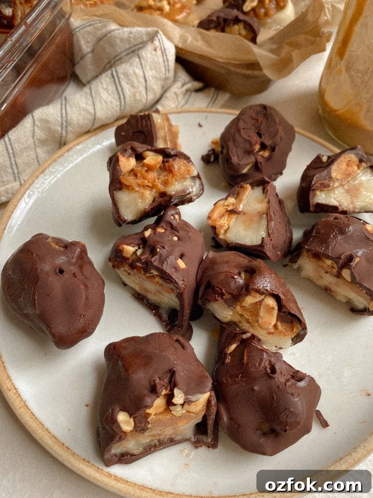 Vegan Gluten-Free Banana Snickers Bites Recipe 4 banana snickers bites on a plate with caramel and chocolate in the background