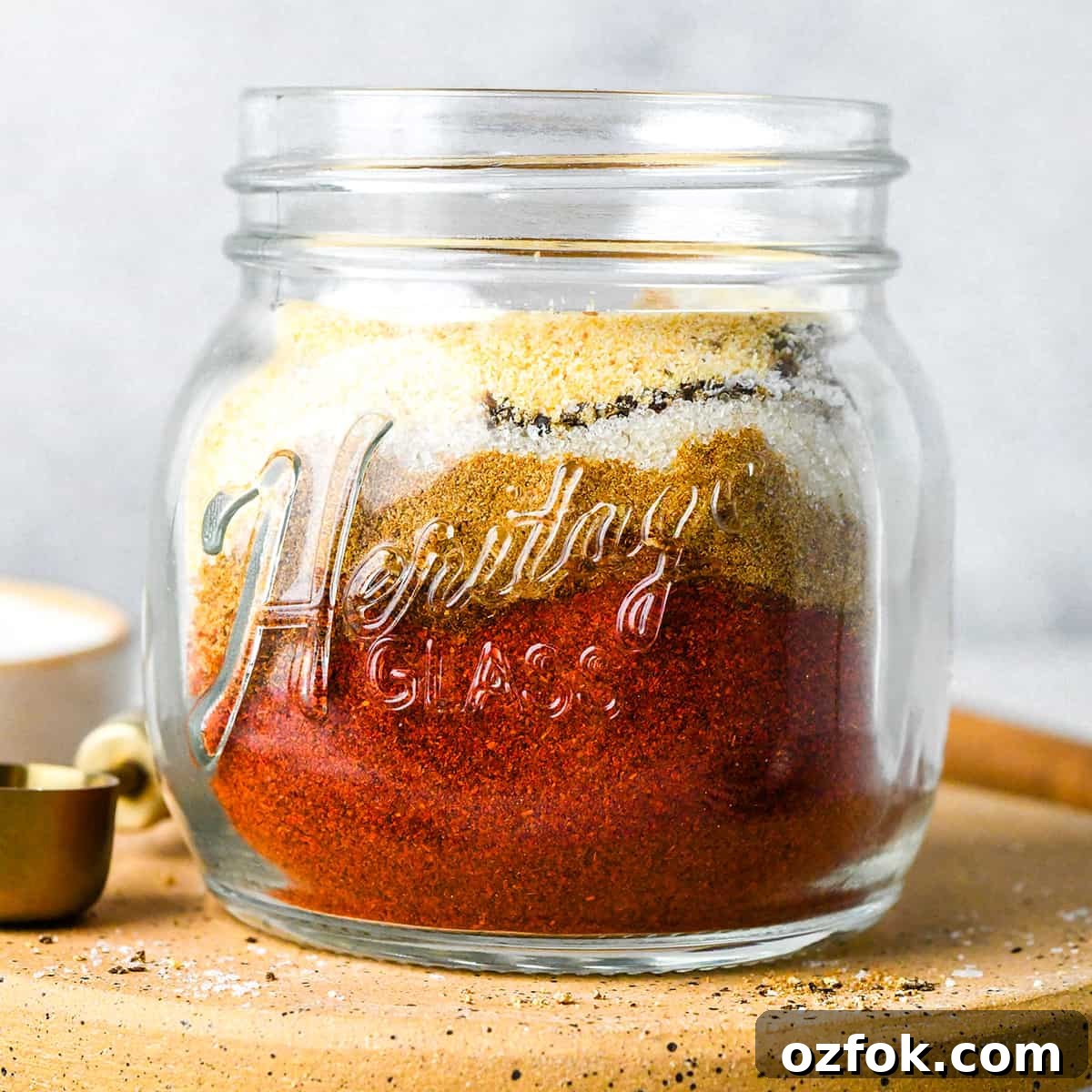 Homemade Chili Seasoning Blend for Bold, Authentic Flavor 6 Homemade Chili Seasoning Recipe ingredients in a glass jar before shaking