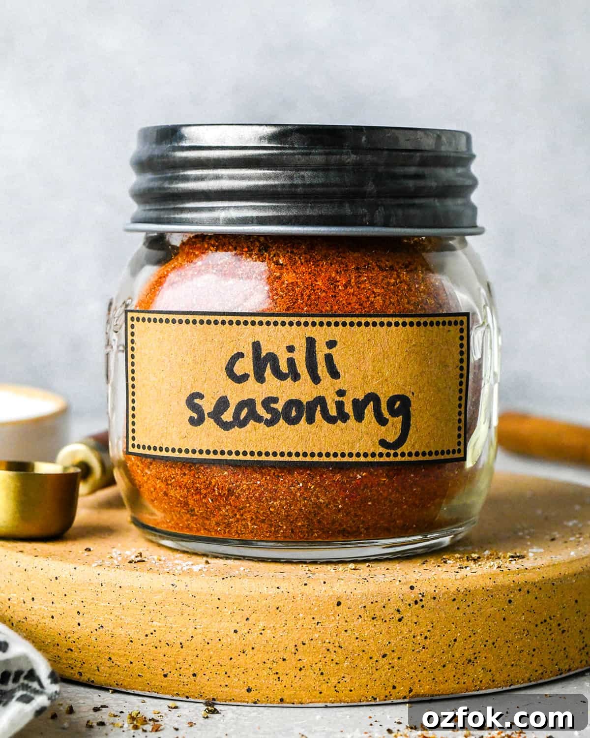 Homemade Chili Seasoning Blend for Bold, Authentic Flavor 9 Homemade Chili Seasoning mix in a glass jar with a label and a lid