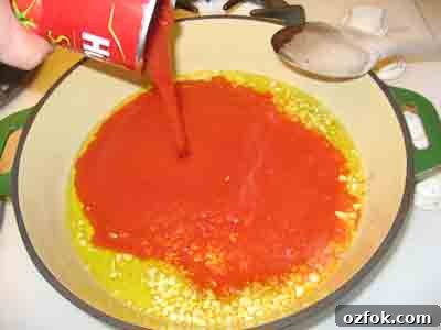 Manestra (Tomato Orzo): Savory Greek-Style One-Pot Pasta 4 For orzo or manestra, pour in a can of tomato sauce.
