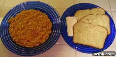 Manestra (Tomato Orzo): Savory Greek-Style One-Pot Pasta 7 Orzo or manestra in tomato sauce with bread and feta.
