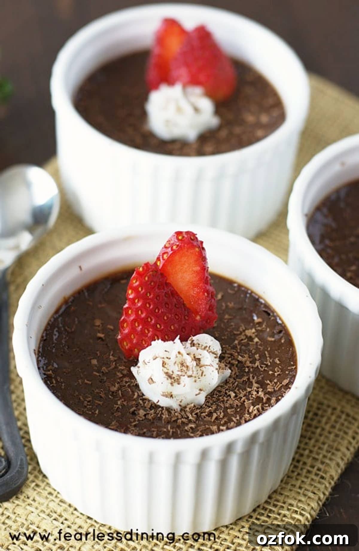 Dark Chocolate Gluten-Free Custard (with Dairy-Free Option) 3 A close up of the chocolate custard in white ramekins.