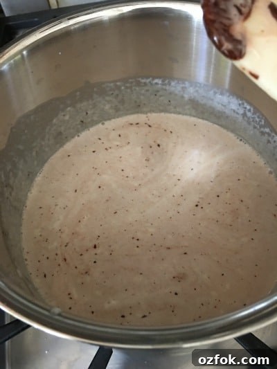 Dark Chocolate Gluten-Free Custard (with Dairy-Free Option) 4 Melting dark chocolate into cream to make gluten free chocolate custard.