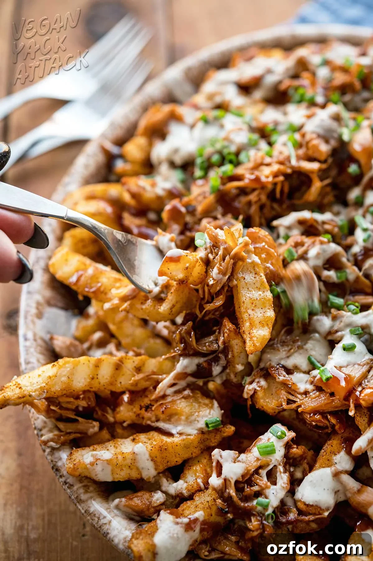 Vegan BBQ Ranch Fries — Perfect Party Appetizer 10 Close up of fork picking up loaded bbq fries