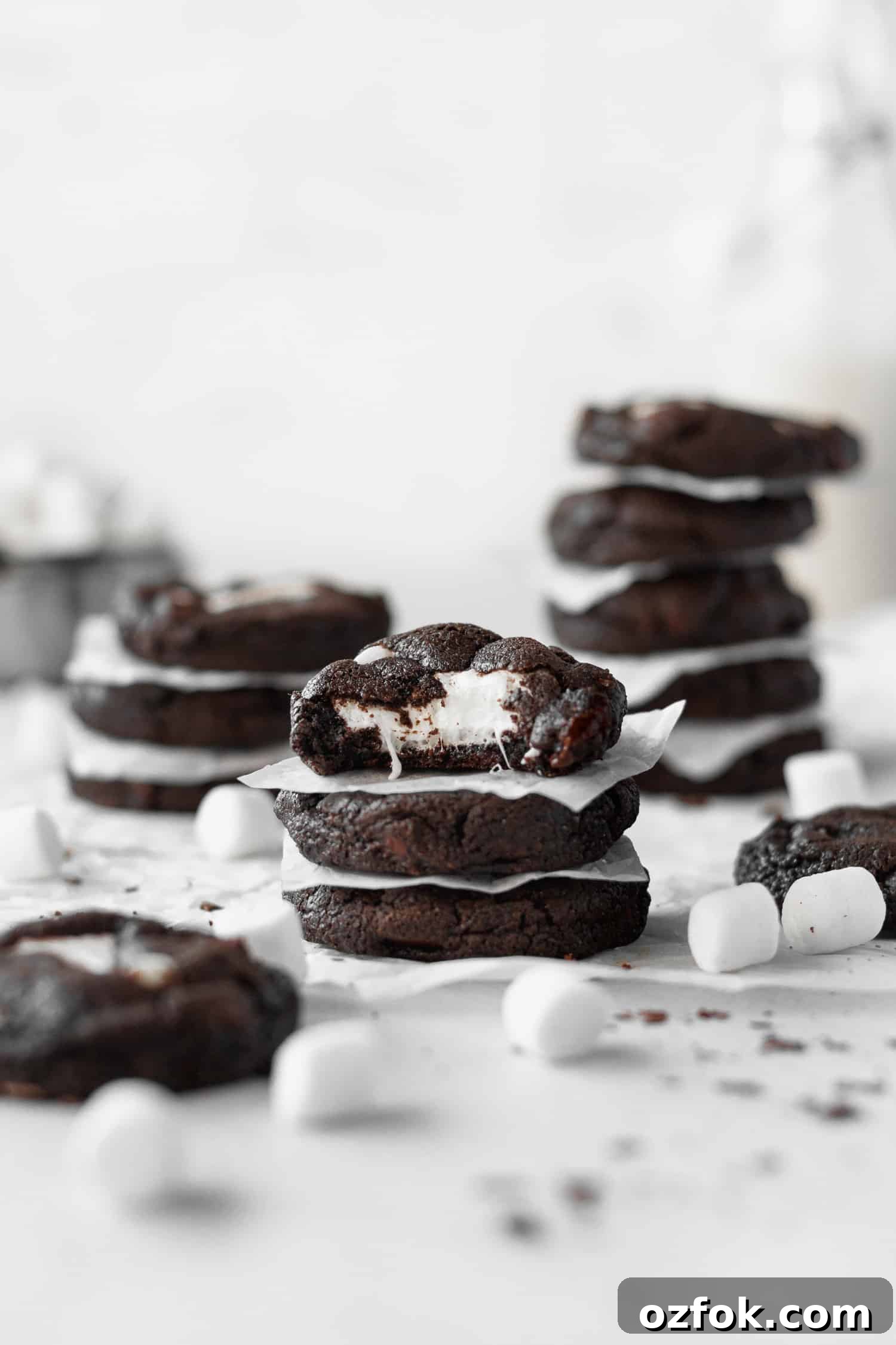Gluten-Free Chocolate Cookies Stuffed with Gooey Marshmallows 6 Stacks of marshmallow stuffed gluten-free chocolate cookies