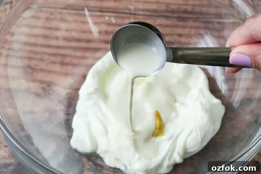 How to Make Mexican Crema with Greek Yogurt: Simple Substitute 5 adding milk to the mexican crema substitute