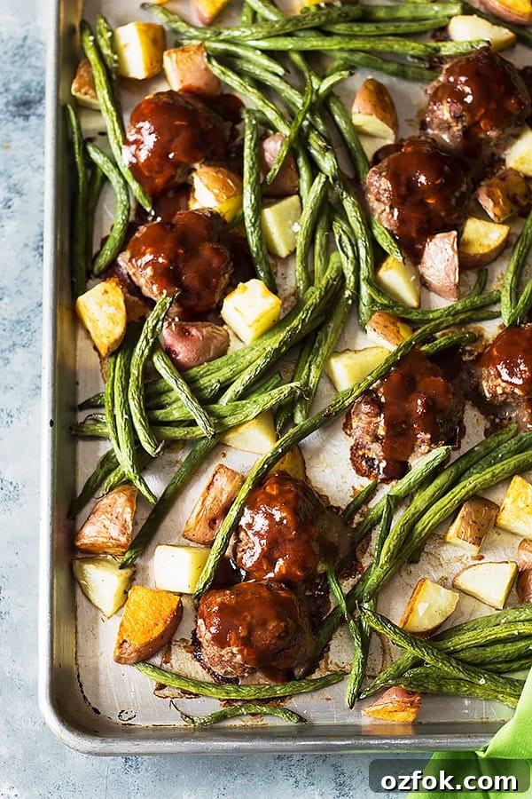 Sheet Pan BBQ Meatballs with Green Beans and Potatoes 2 a sheet pan full of bbq meatballs, green beans, and roasted potatoes