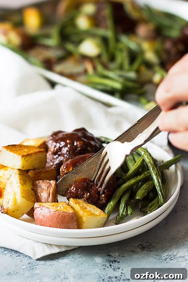 Sheet Pan BBQ Meatballs with Green Beans and Potatoes 4 sheet pan bbq meatballs and roasted veggies on a plate