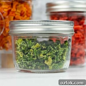 Dehydrating Celery: Step-by-Step Guide for Crispy, Long-Lasting Stalks 12 Dehydrated celery in a small glass mason jar.