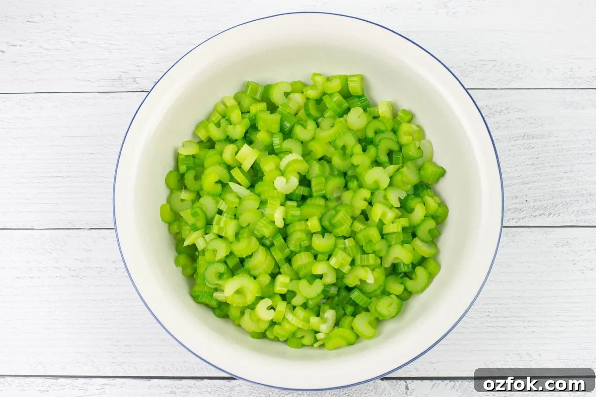 Dehydrating Celery: Step-by-Step Guide for Crispy, Long-Lasting Stalks 3 Thinly slice celery in a large enamel bowl.