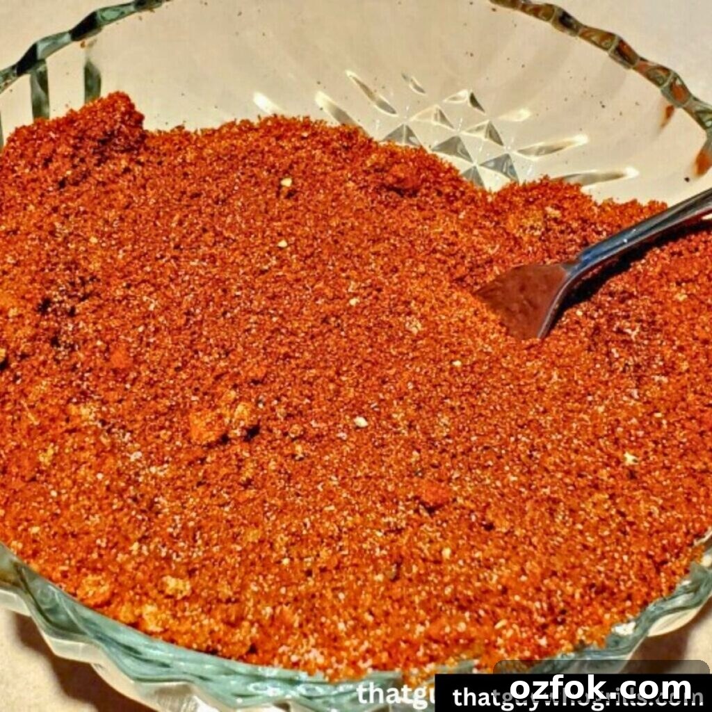 Brown Sugar Brisket Rub for Smoking: Sweet & Savory Blend 3 Homemade brown sugar rub for brisket in a bowl with a fork