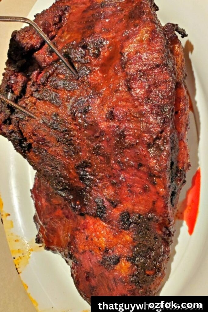 Brown Sugar Brisket Rub for Smoking: Sweet & Savory Blend 7 Smoked Brisket on Serving platter