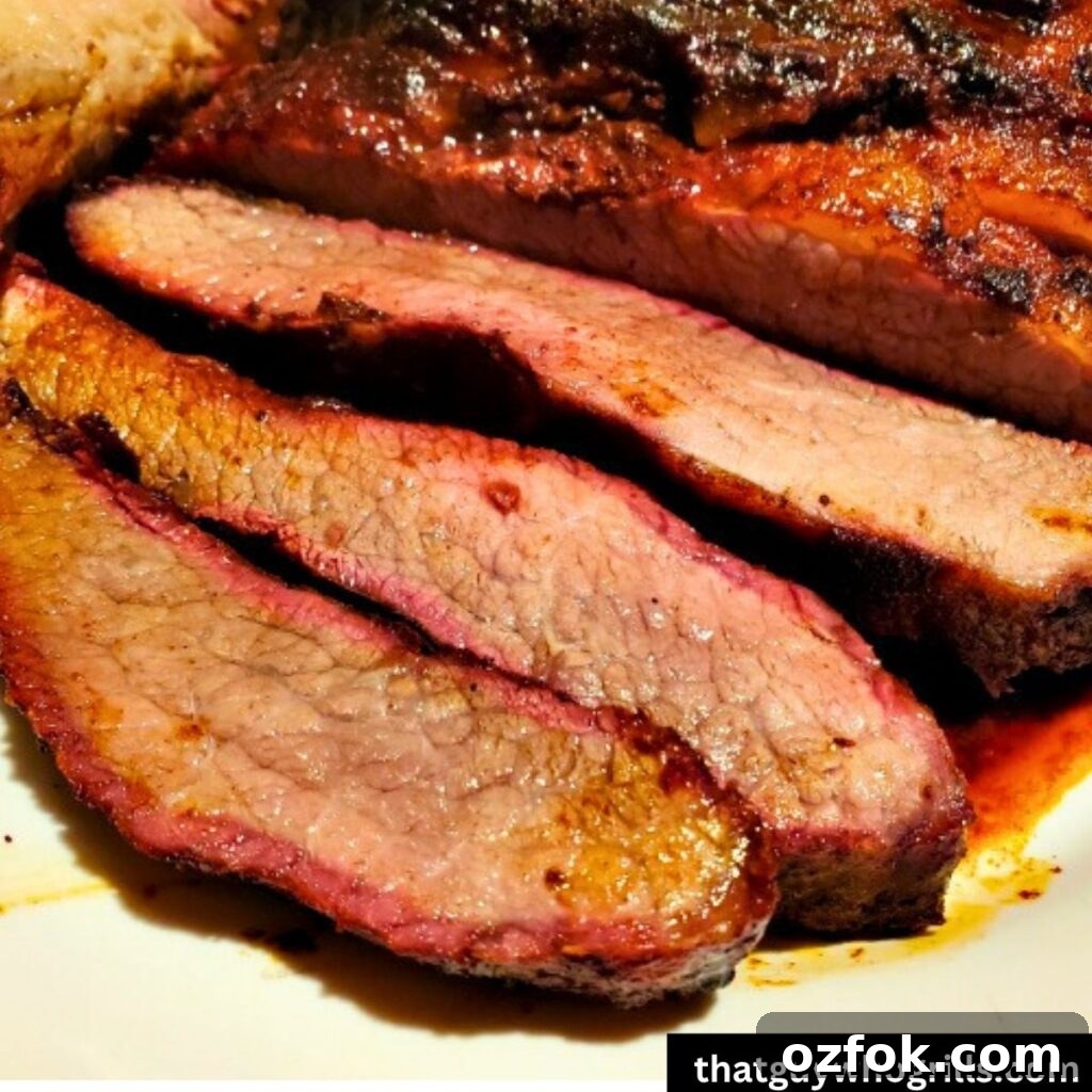 Brown Sugar Brisket Rub for Smoking: Sweet & Savory Blend 8 Sliced smoked brisket on a white platter