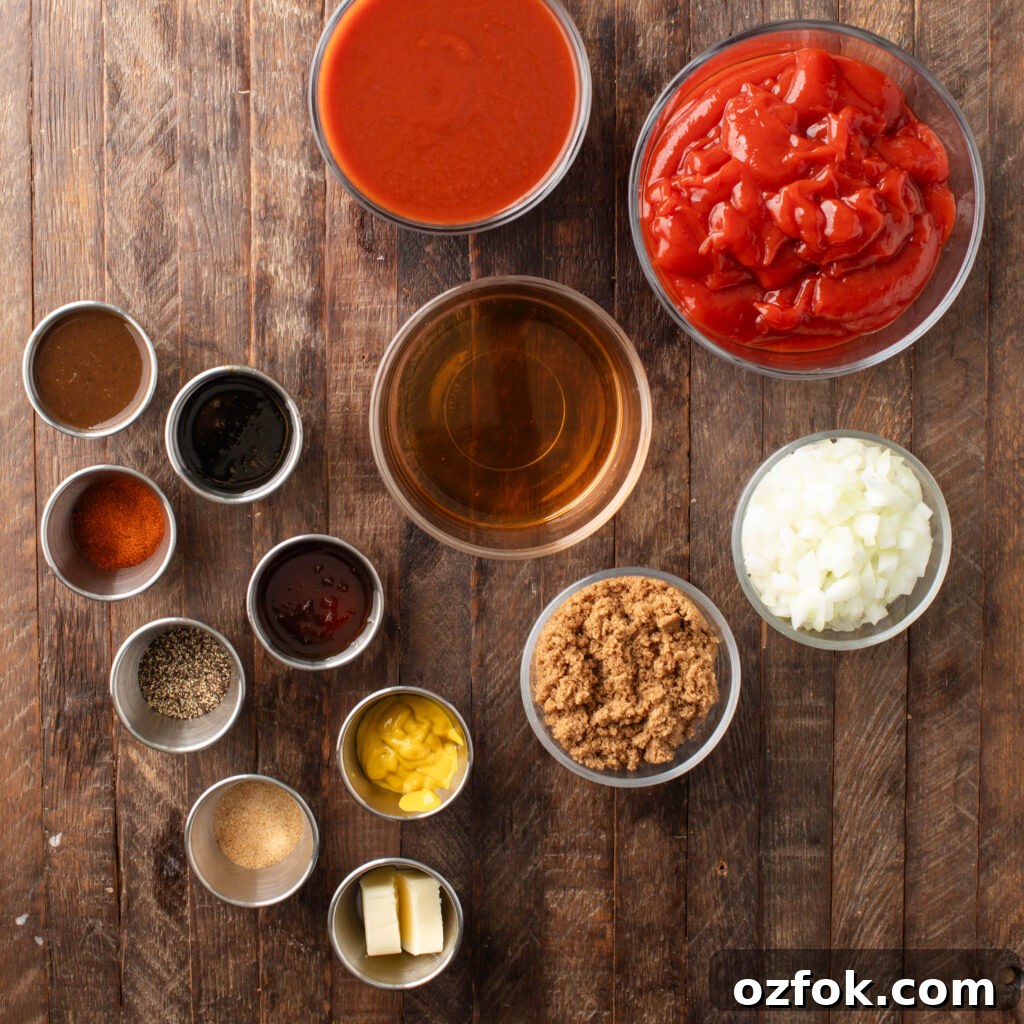 Sweet and Spicy Barbecue Sauce Recipe for Grilling and Dipping 3 sweet & spicy bbq sauce ingredients. bowls of ketchup, diced onion, apple cider vinegar, brown sugar, tomato sauce, pinch bowls with molasses, honey, mustard, unsalted butter, granulated garlic, black pepper, Worcestershire sauce, and chipotle chili powder