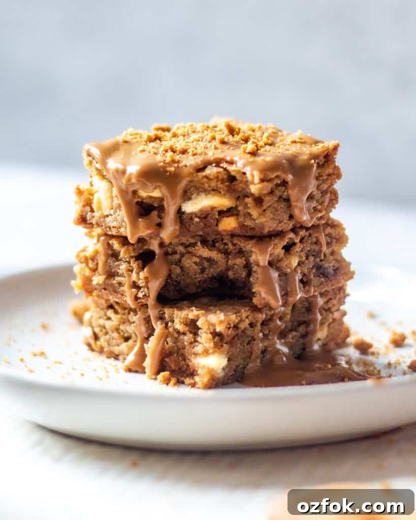 Biscoff Blondies with White Chocolate Swirl 4 Biscoff and White Chocolate Blondies stacked