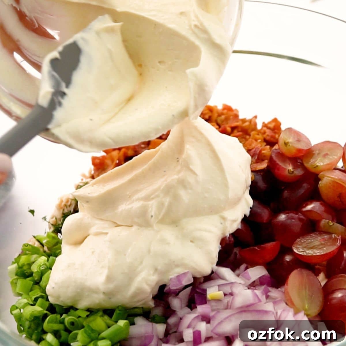 Instant Pot Chicken Salad with Bacon + How-To Video 5 adding the homemade dressing to the chicken salad