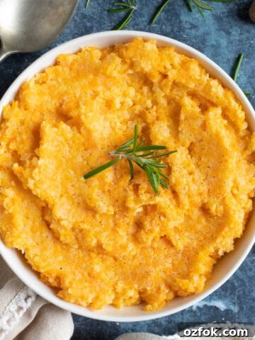 A bowl of carrot and swede mash.