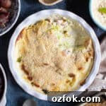 Creamy Southern-Style Cabbage Recipe for Weeknight Dinners 10 Creamed cabbage in white serving dish.
