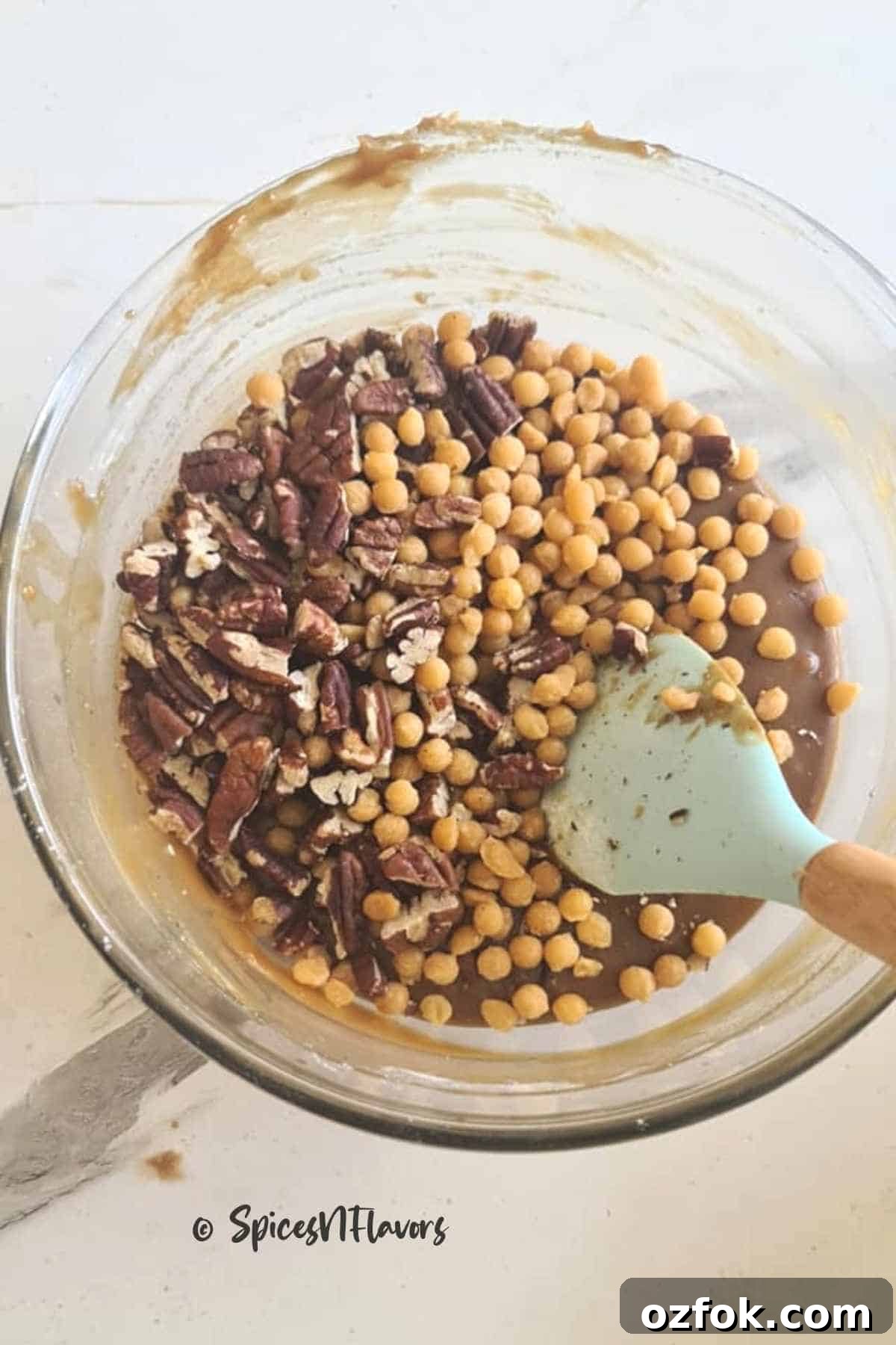 Eggless Butterscotch Blondie Recipe — Moist, Chewy Bars 6 Fold the add-ons: pecans and butterscotch chips