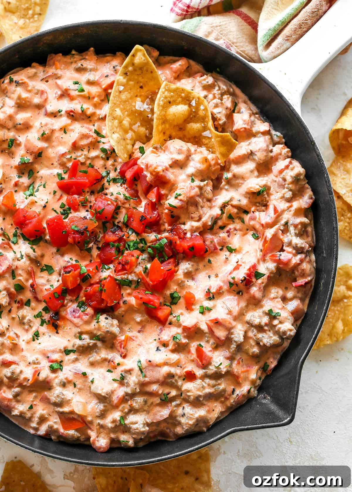 overhead view of Cream Cheese Sausage Dip in a skillet