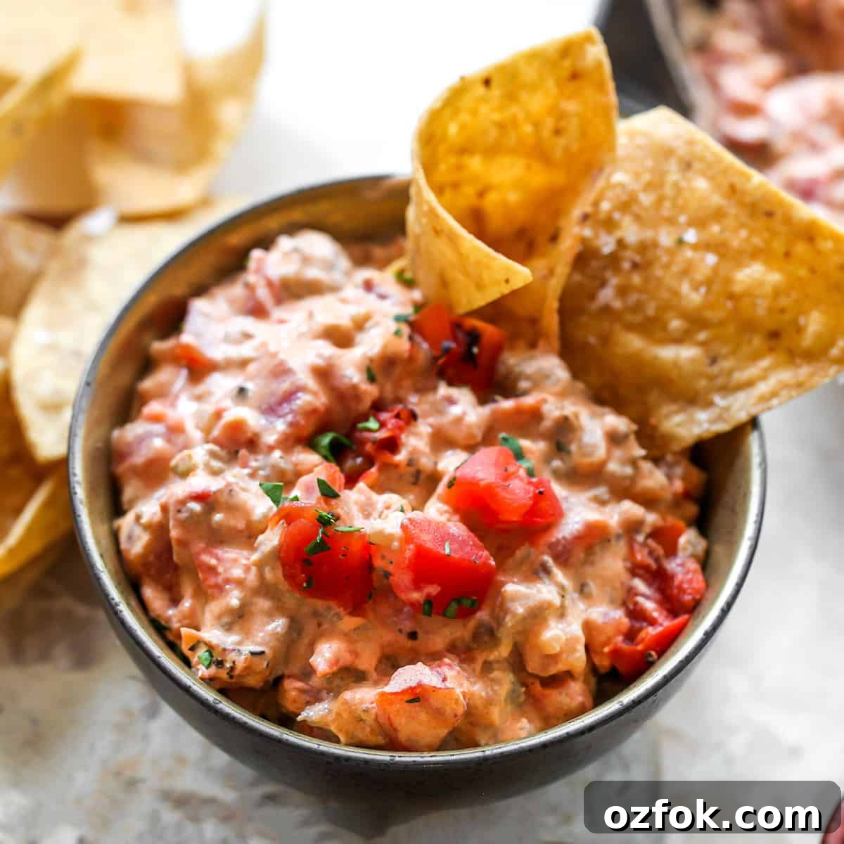 bowl of Cream Cheese Sausage Dip with chips