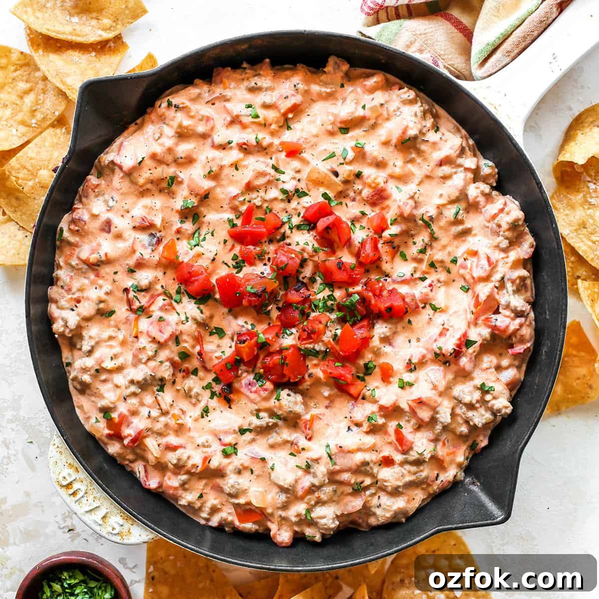 overhead view of Cream Cheese Sausage Dip in a skillet