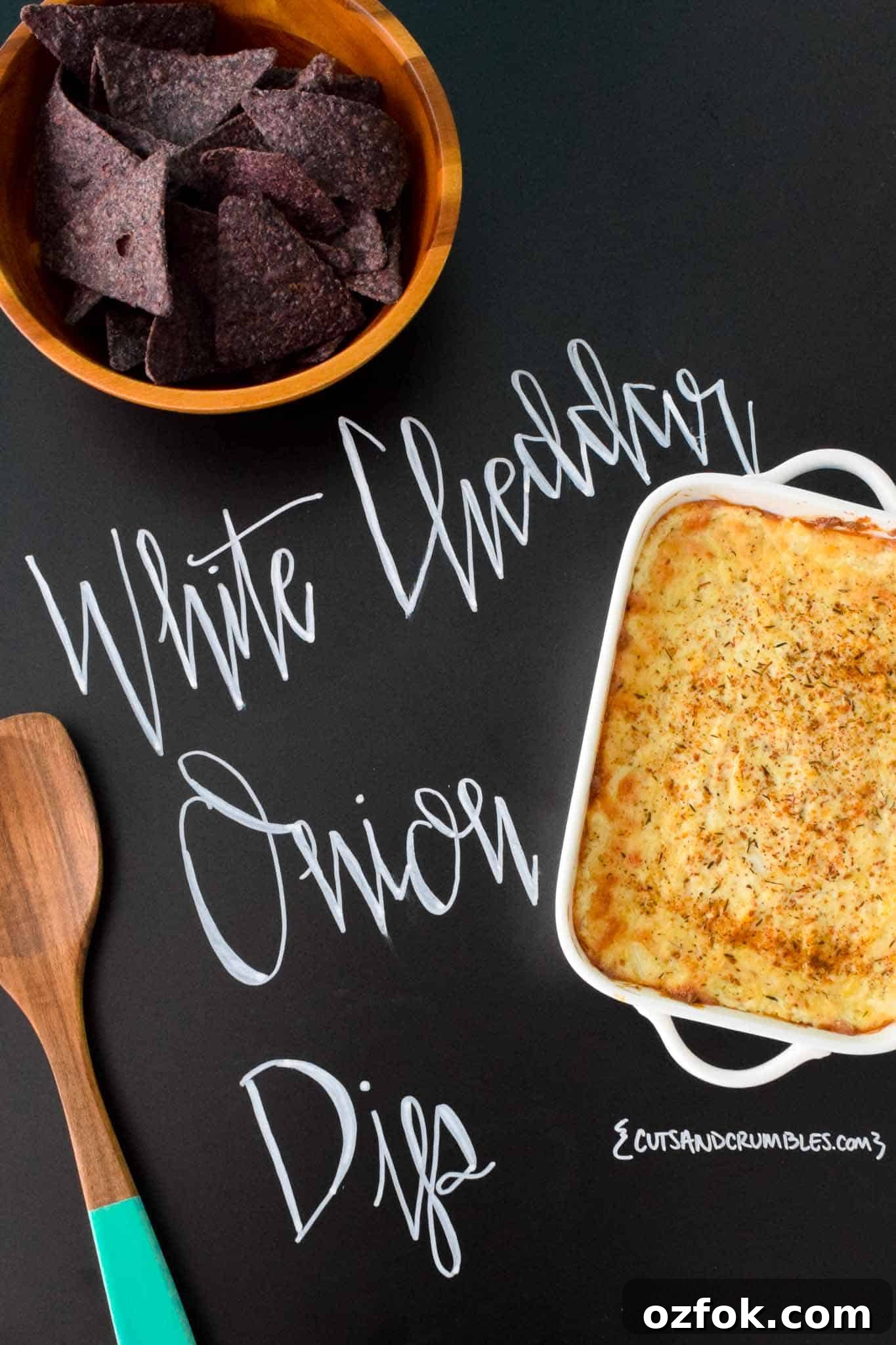 White Cheddar Onion Dip with title written on chalkboard