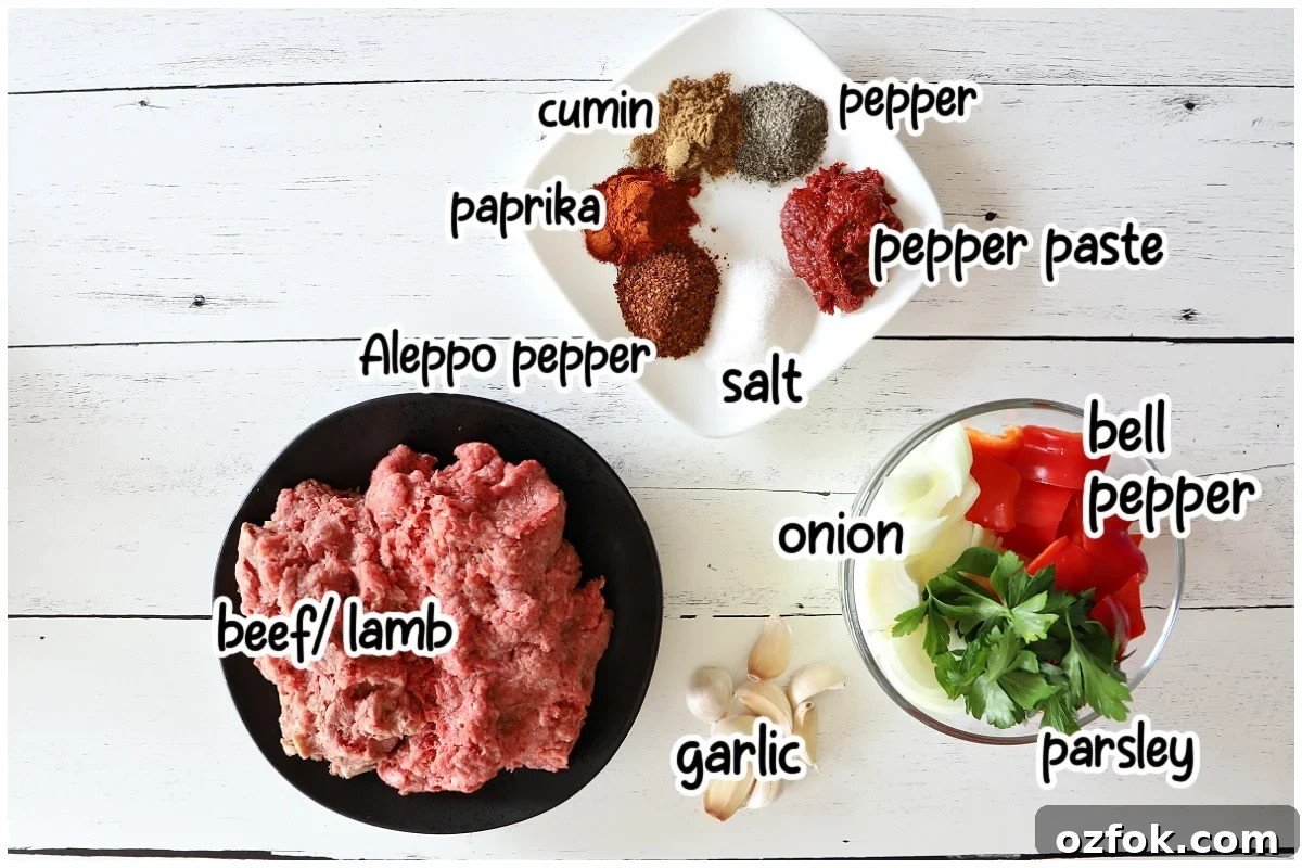 Ingredients for the Adana Kebab on a wooden board.