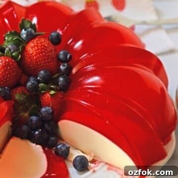 A close up photo of cream jello Cake on a plate