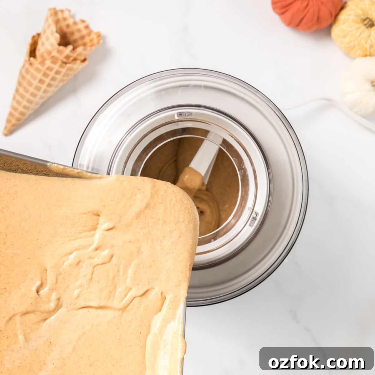 Ice cream base pouring into an ice cream maker.