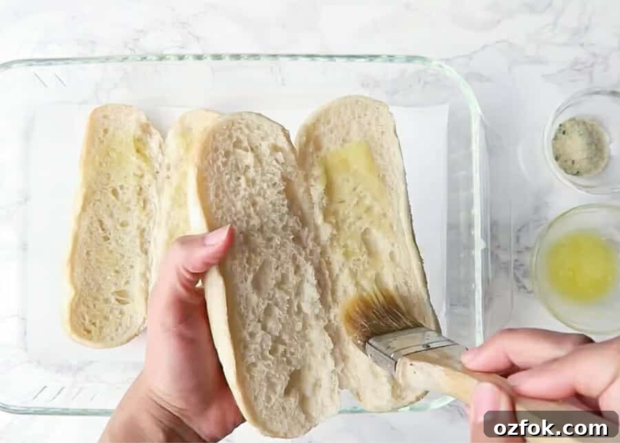 buttering bread for subs